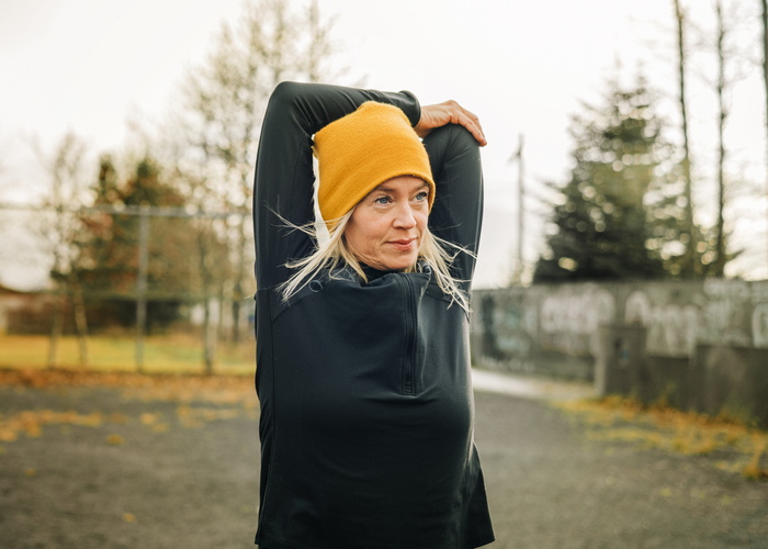 Woman stretching before fun