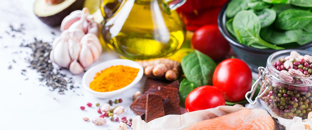 picture of healthy foods laying on white table